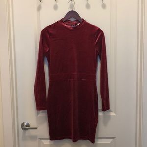 Velvet looking mini dress w/ expose back.